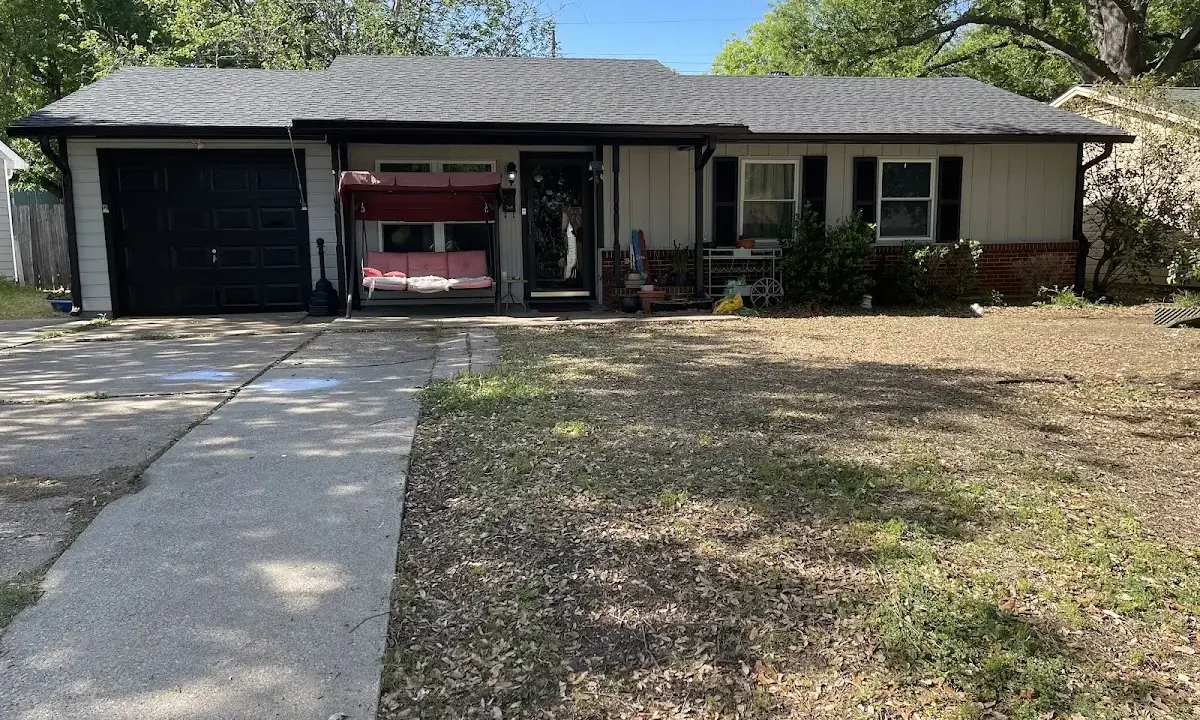 Hail Damage Roof Repair crew at work on a residential roof in Hondo